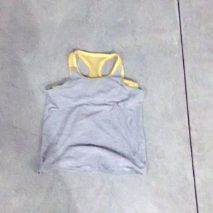 Tank-top with yellow sports bra